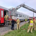 Les pompiers de Merelbeke s'exercent sur les accidents ferroviaires lors d'un atelier de la SNCB à Melle (Photo: SNCB)