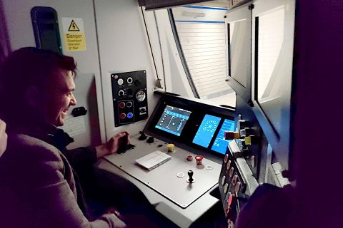 Seated at the controls in front of an in-cab signalling display, is GTR project lead and qualified driver Oliver Turner (ECDP Media)