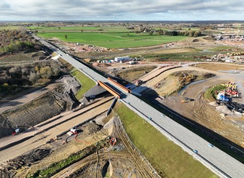 Aerial view of the civil engineering works for the crossing of East West Rail over the HS2 line in the UK
