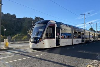 Edinburgh Tram passing Edinburgh Castle