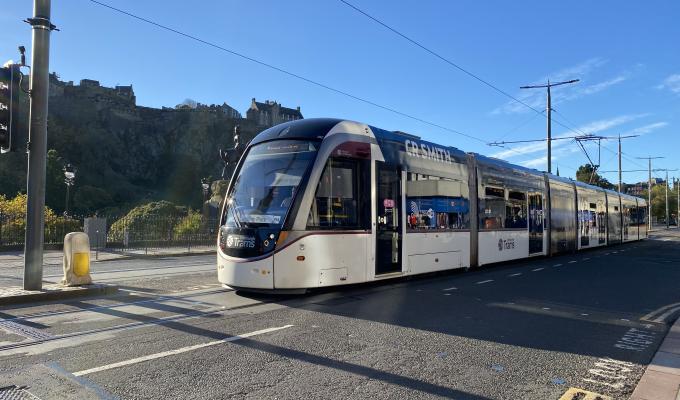 Edinburgh Tram passing Edinburgh Castle