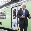 Premier Boris Johnson reisde per trein naar de Klimaattop in Glasgow, foto: ANP