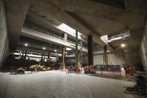 Inside the empty station box at Old Oak Common looking up to the daylight overhead