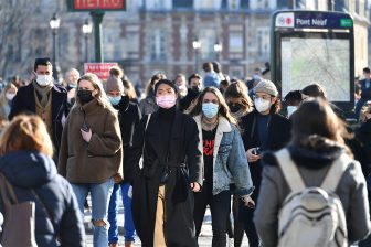 Masked crowd in Paris in 2021, during the COVID19 Pandemic (Shutterstock)
