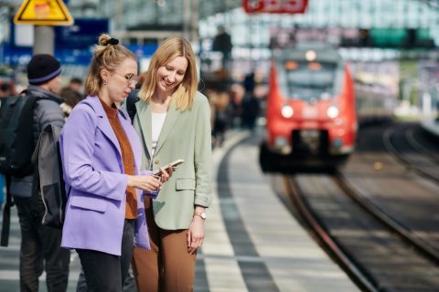 Passengers waiting to board a train in Germany