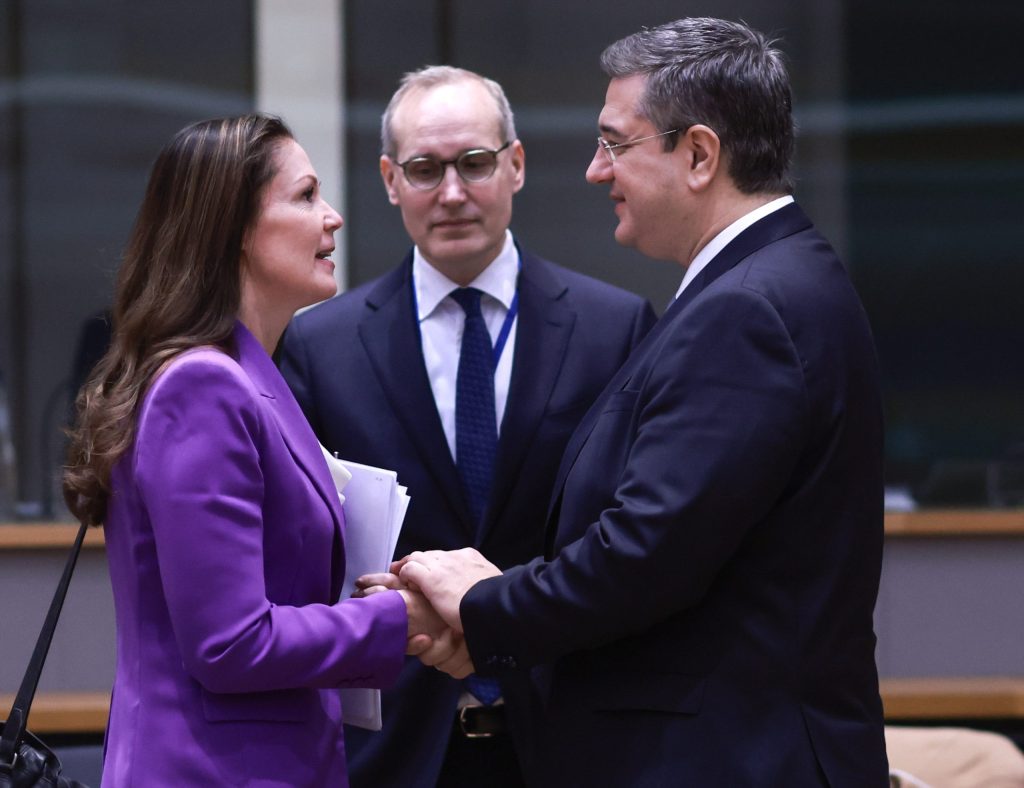 Finland Minister of Transport Lulu Ranne greets European Commissioner for Sustainable Transport and Tourism Apostolos Tzitzikostas.
